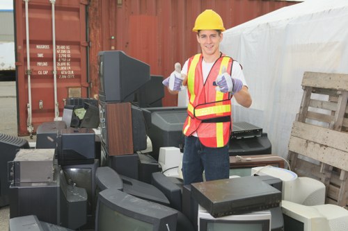 Business professionals managing waste in an office environment