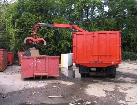 Street view of Sudbury businesses and recycling bins